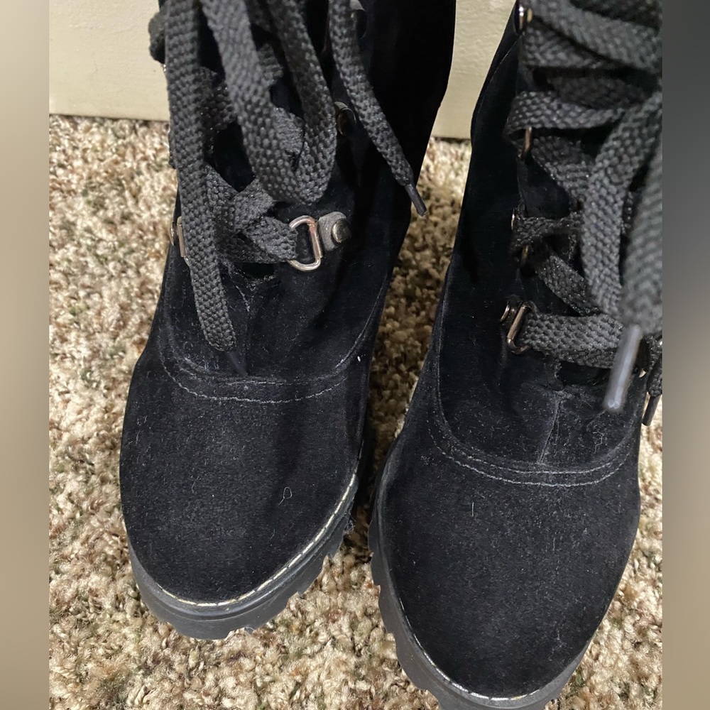 Ankle lace up boots.